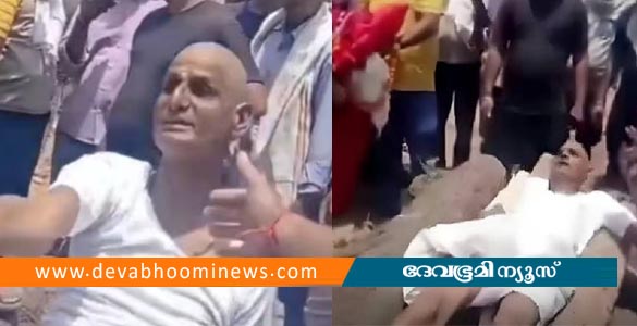'ആഭരണങ്ങൾ എനിക്കു വേണം'; അമ്മയുടെ ചിതയ്ക്ക് മുകളിൽ കിടന്ന് മകന്‍റെ പ്രതിഷേധം